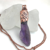 Raw amethyst crystal pendant with copper cap, pentagram stamp, and bindrunes for protection, safe travels, strength, and good luck.